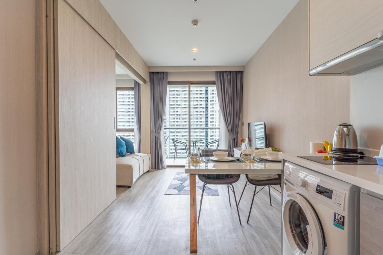 Aeras Beachfront Condominium Praia de Jomtien Exterior foto
