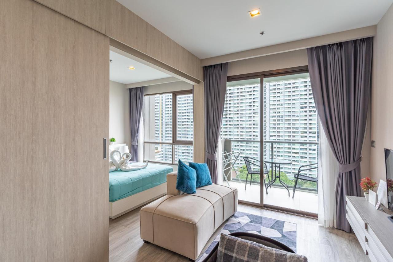 Aeras Beachfront Condominium Praia de Jomtien Exterior foto